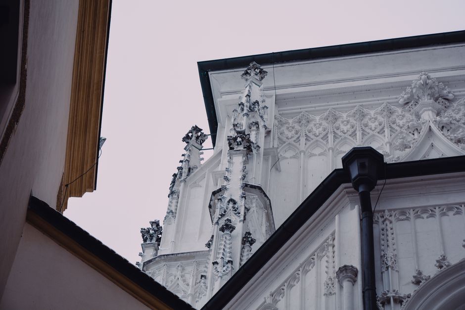 Ornate Gothic architecture showcasing intricate stone carvings in Passau, Germany.
